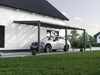 Alufuchs Carport Wandgebunden im Curved Design aus Aluminium in Anthrazit mit 3 Pfosten am Einfamilienhaus
