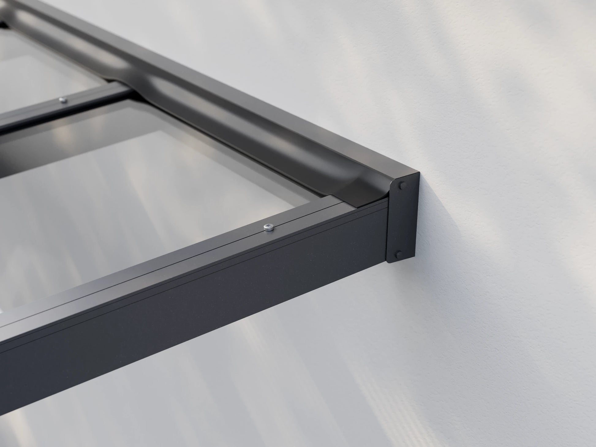 Wandgebundene Alufuchs Überdachung mit VSG Glas Klar – Detailansicht der Dachanbindung an die Hauswand